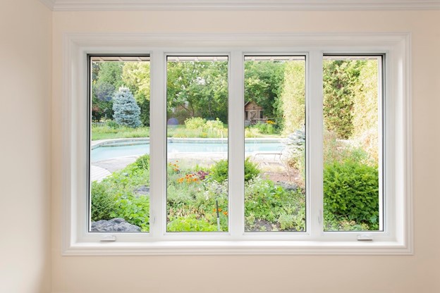 energy efficient windows - image of windows overlooking a backyard